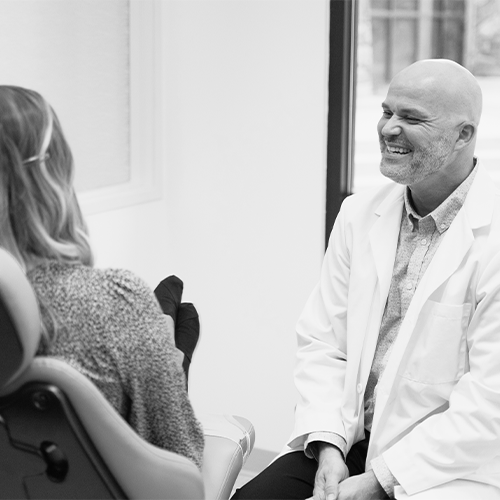 Doctor discussing treatment plans with his patient.