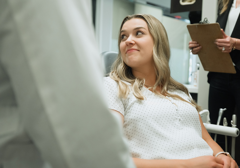 Patient sitting in a dentist chair